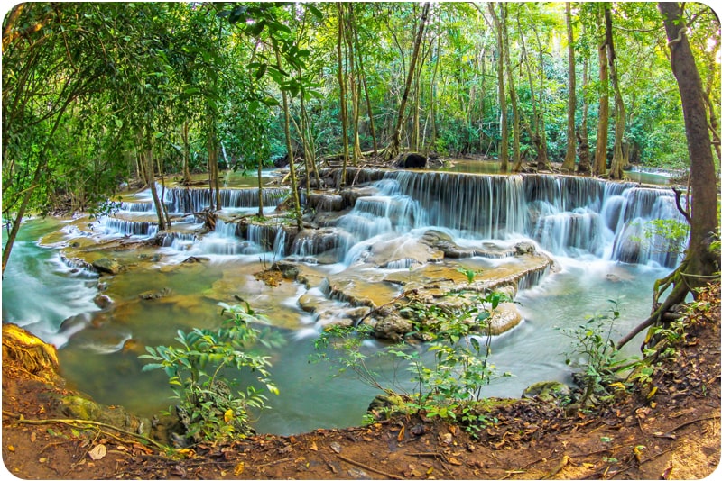 Places to visit in Thailand: Discover the magic of Erawan Waterfalls.