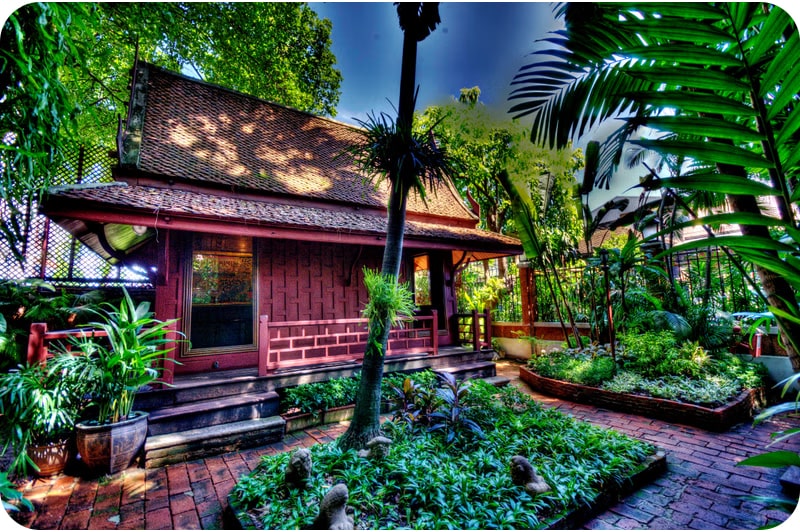 Traditional Jim Thompson House with tropical garden showcasing beautiful tourist places in Thailand