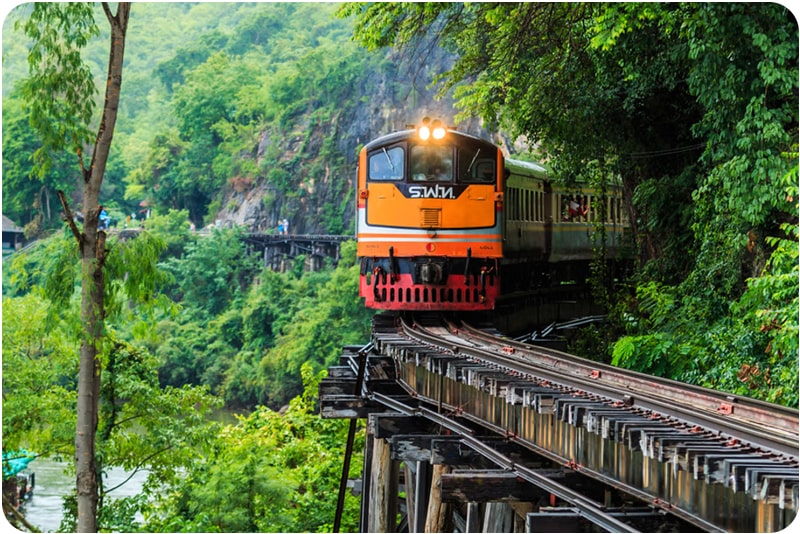 Experience the Death Railway's historical significance. a must-visit place in Thailand for its stunning scenery